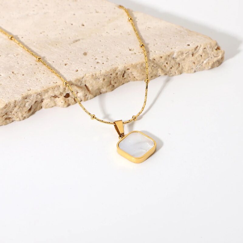 Ivory Gold Locket